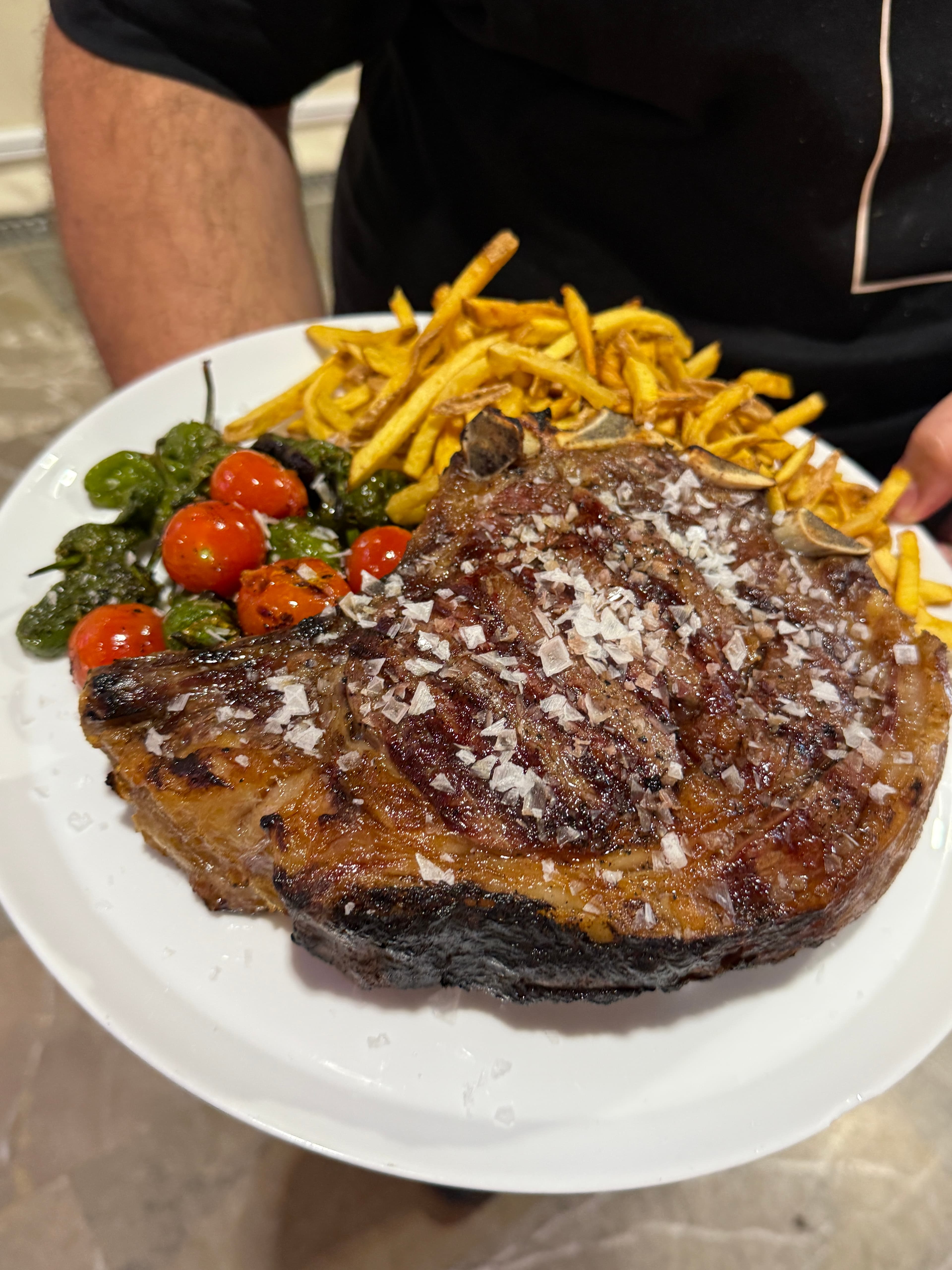 Charcoal-grilled chuleta steak at La Picatería