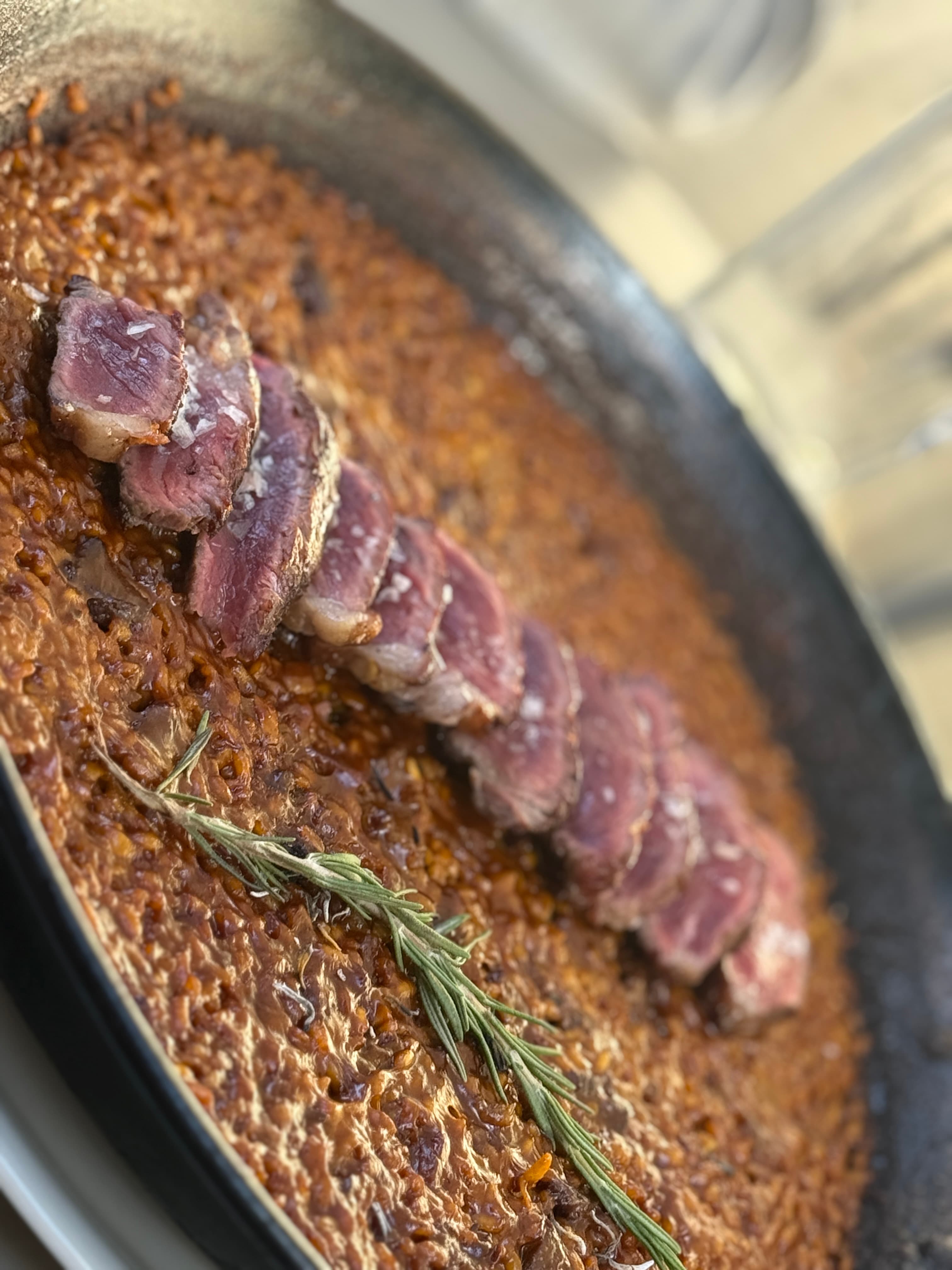 Paella and grilled meat at La Picatería